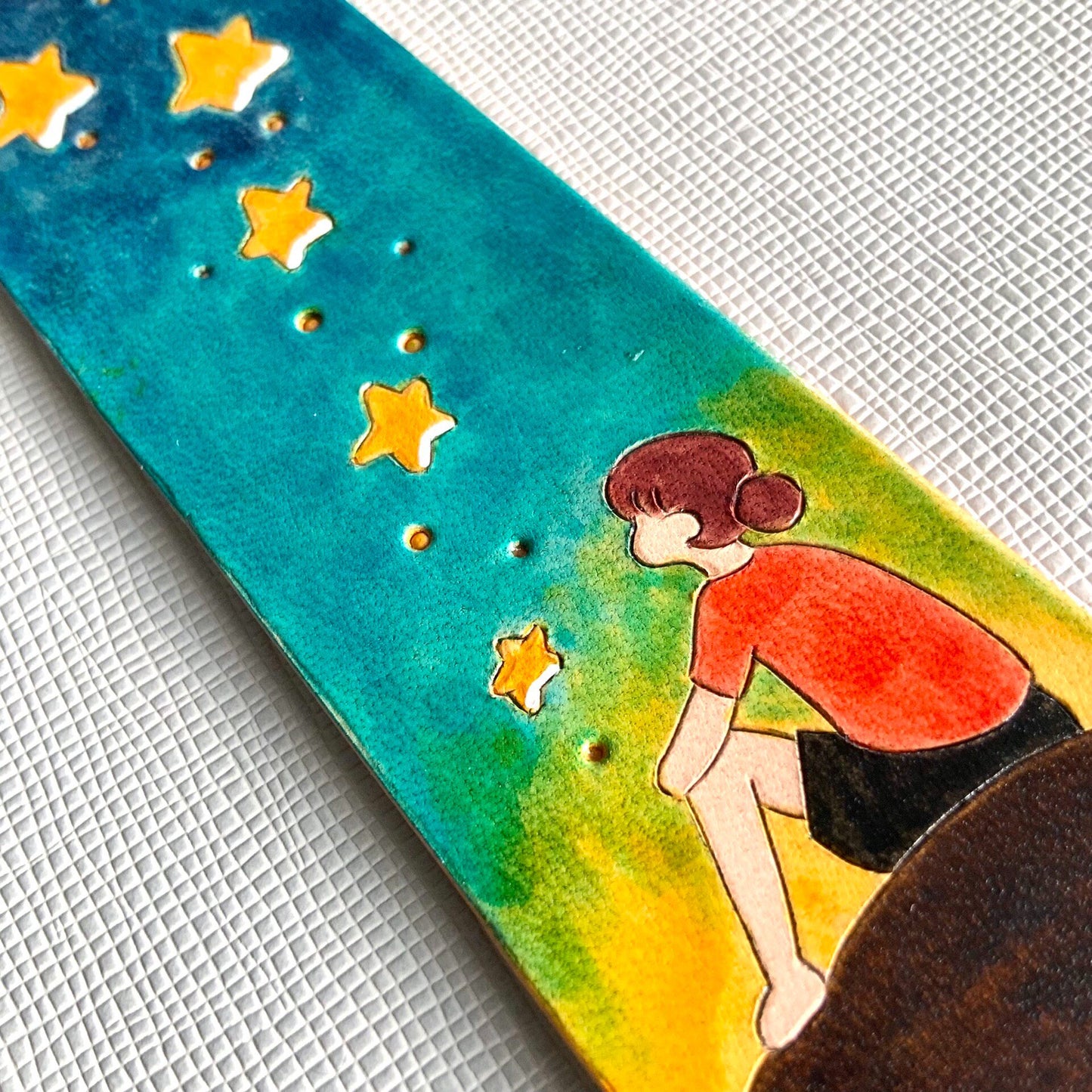 Hand-Painted Leather Bookmark with Star Cutouts