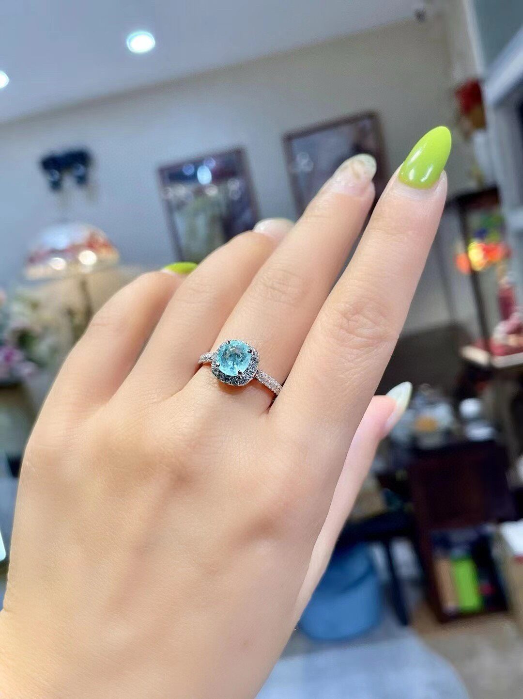 18k Gold Ring with 1.1ct Neon Blue Cushion-Cut Gemstone and 0.41ct Diamond Halo
