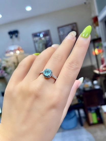 18k Gold Ring with 1.1ct Neon Blue Cushion-Cut Gemstone and 0.41ct Diamond Halo