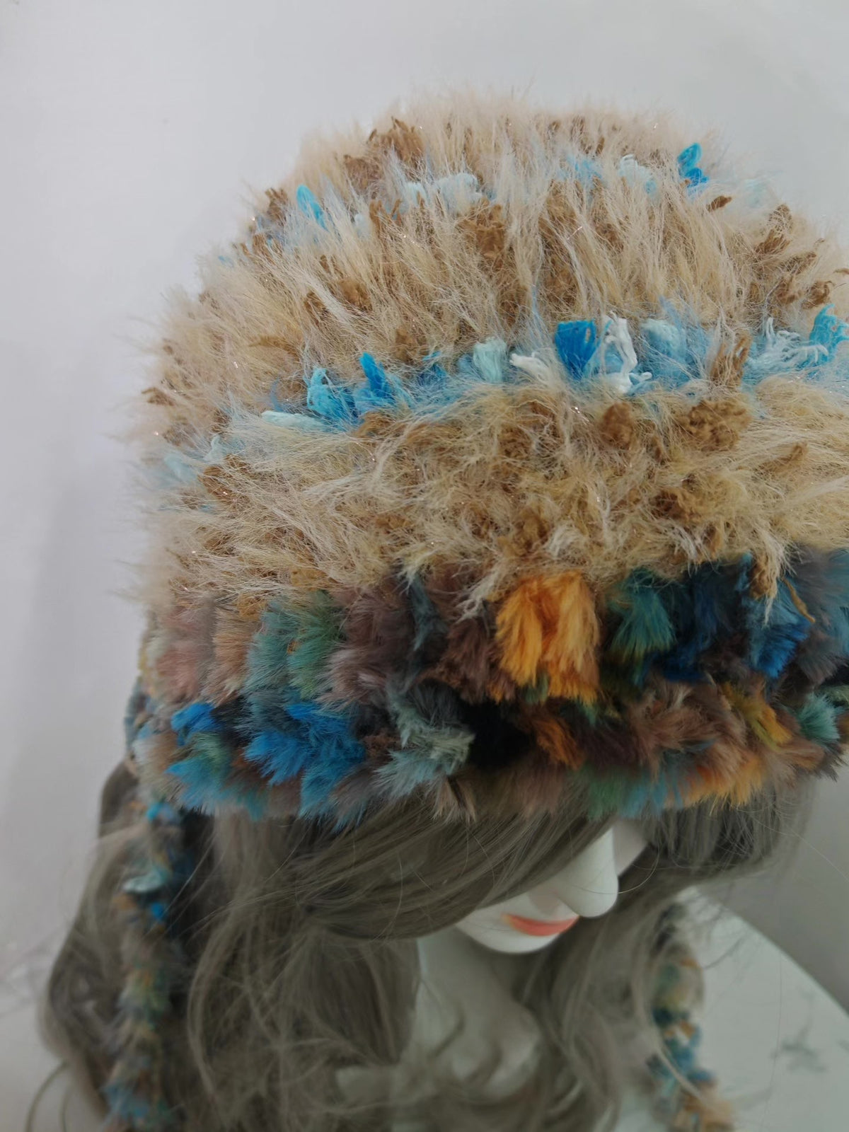 Faux Fur Hood with Braided Tassels