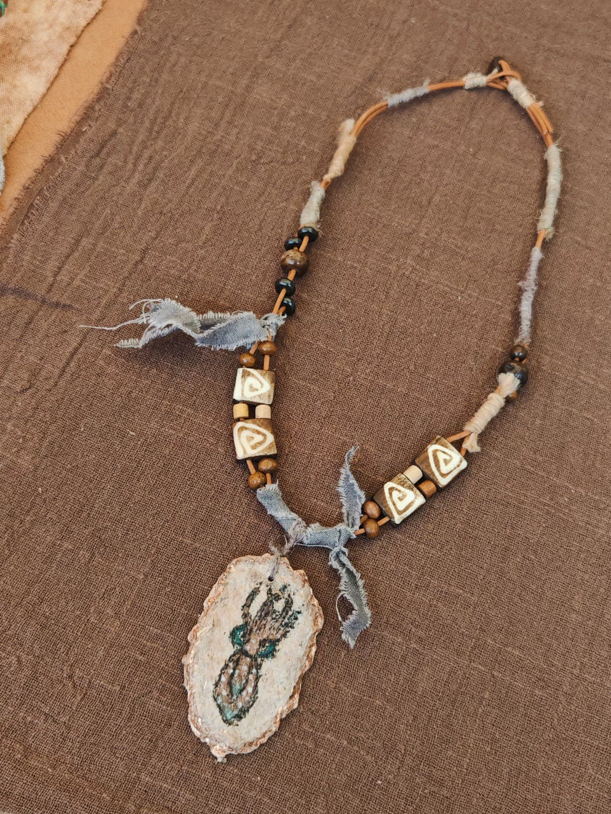 Hand Painted Fossil Pendant Yak Bone Necklace