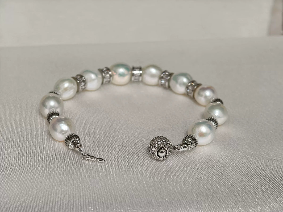 Braccialetto con perle d'acqua baroque rotonde 9-11mm