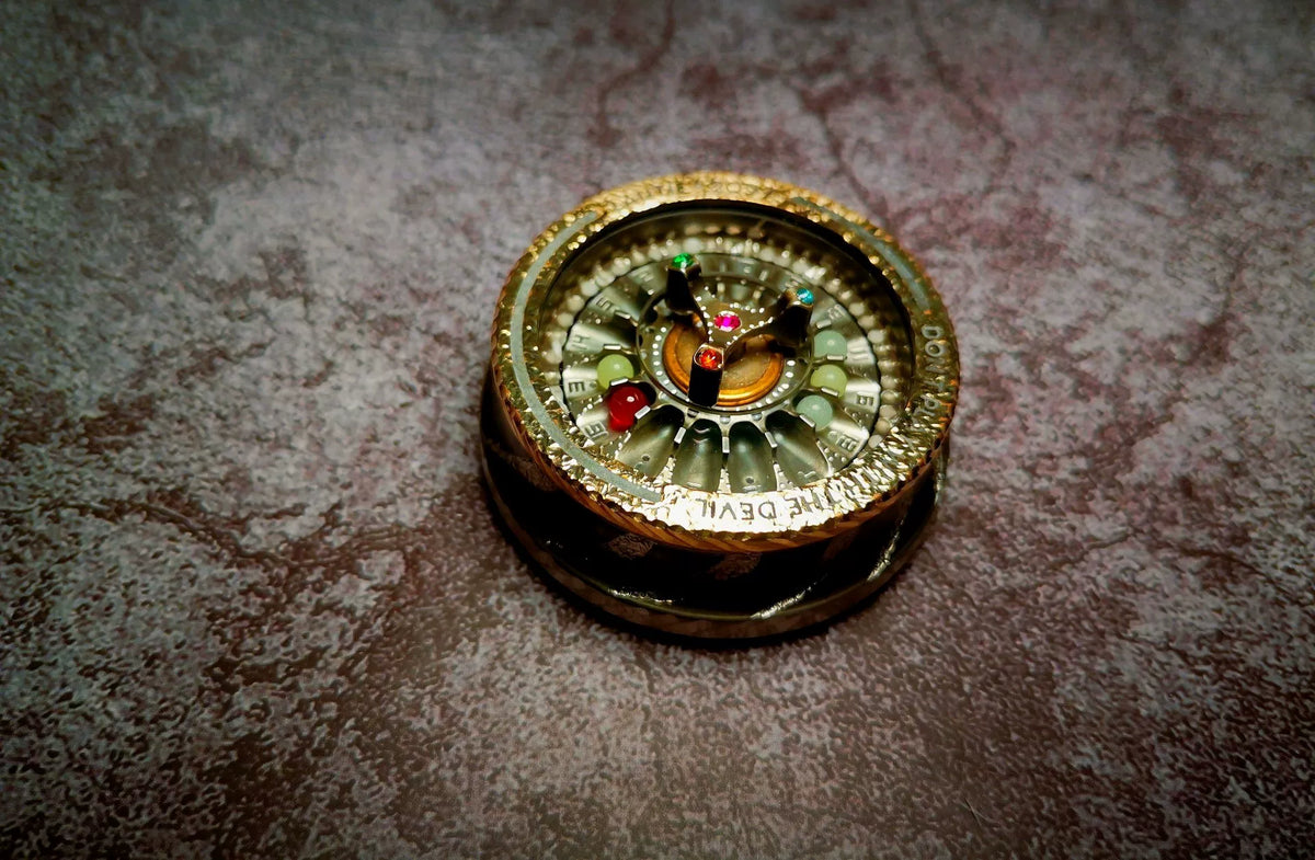Fidget Toy in Metallo a Roulette con Luce UV