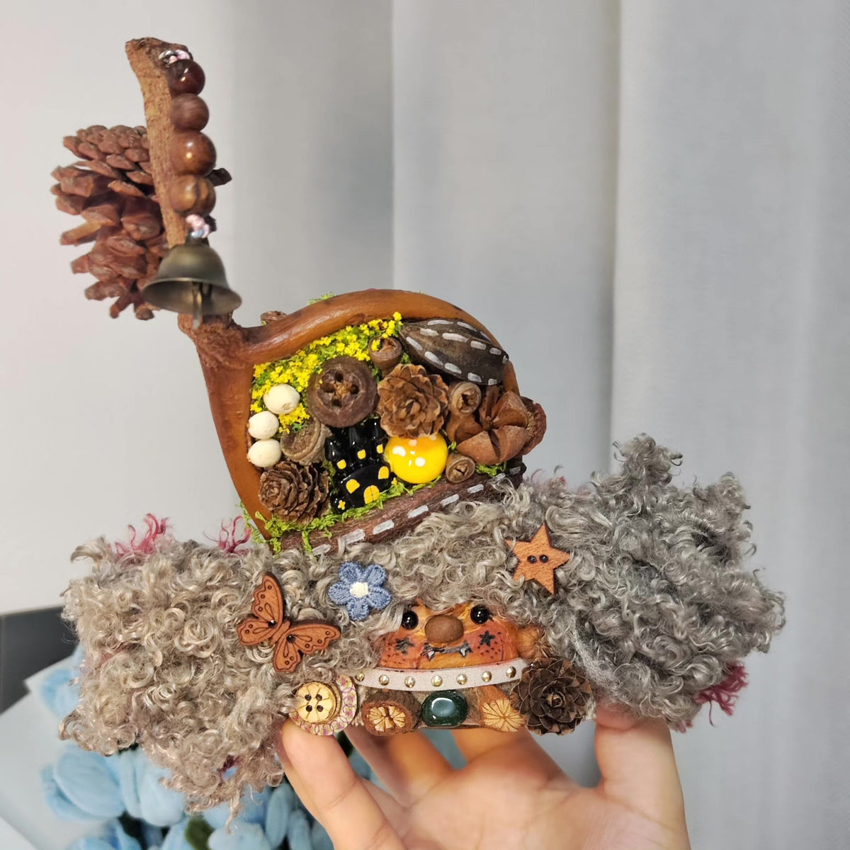 Double-Sided Handcrafted Figurine with Pinecone Bell