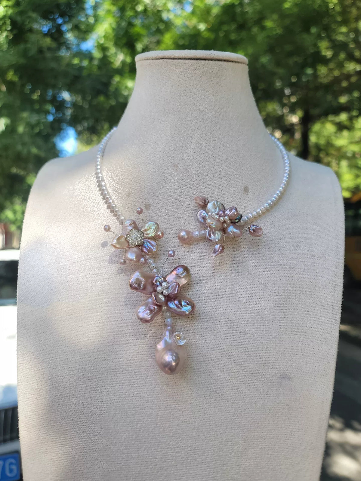 Collana floreale in perle barocche rosa e lavanda