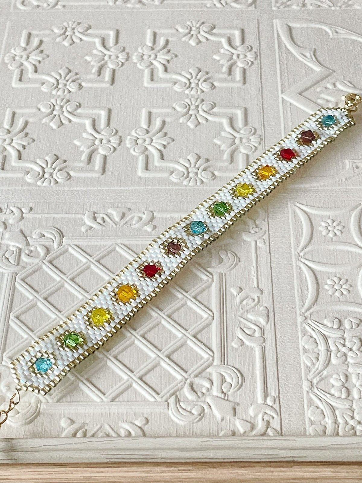 White Beaded Bracelet with Rainbow Accents