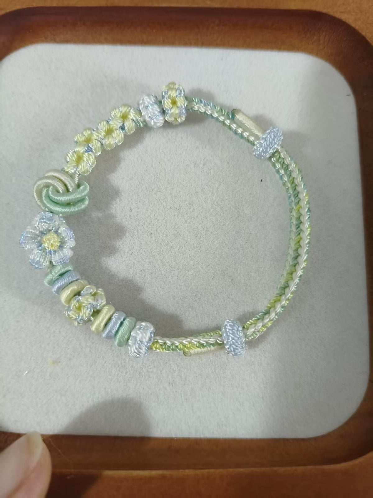 Handwoven Gradient Bracelet with Floral Decor