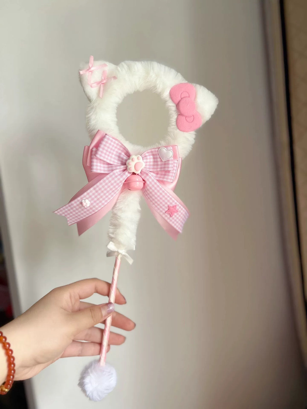 Rosa trollstav med mjuk katt