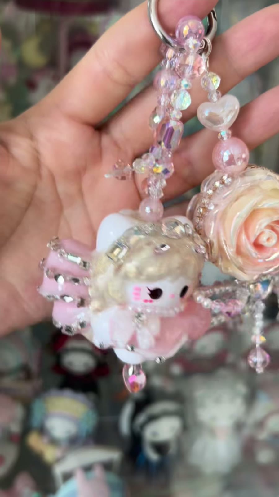 Roze Kraalpop Telefoonhanger met Strass Roos