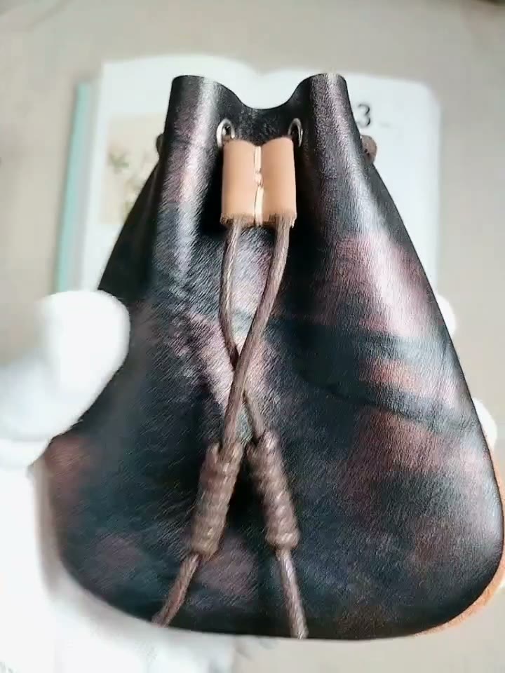 Bolsa de cuero plena flor con cordón, hecha a mano