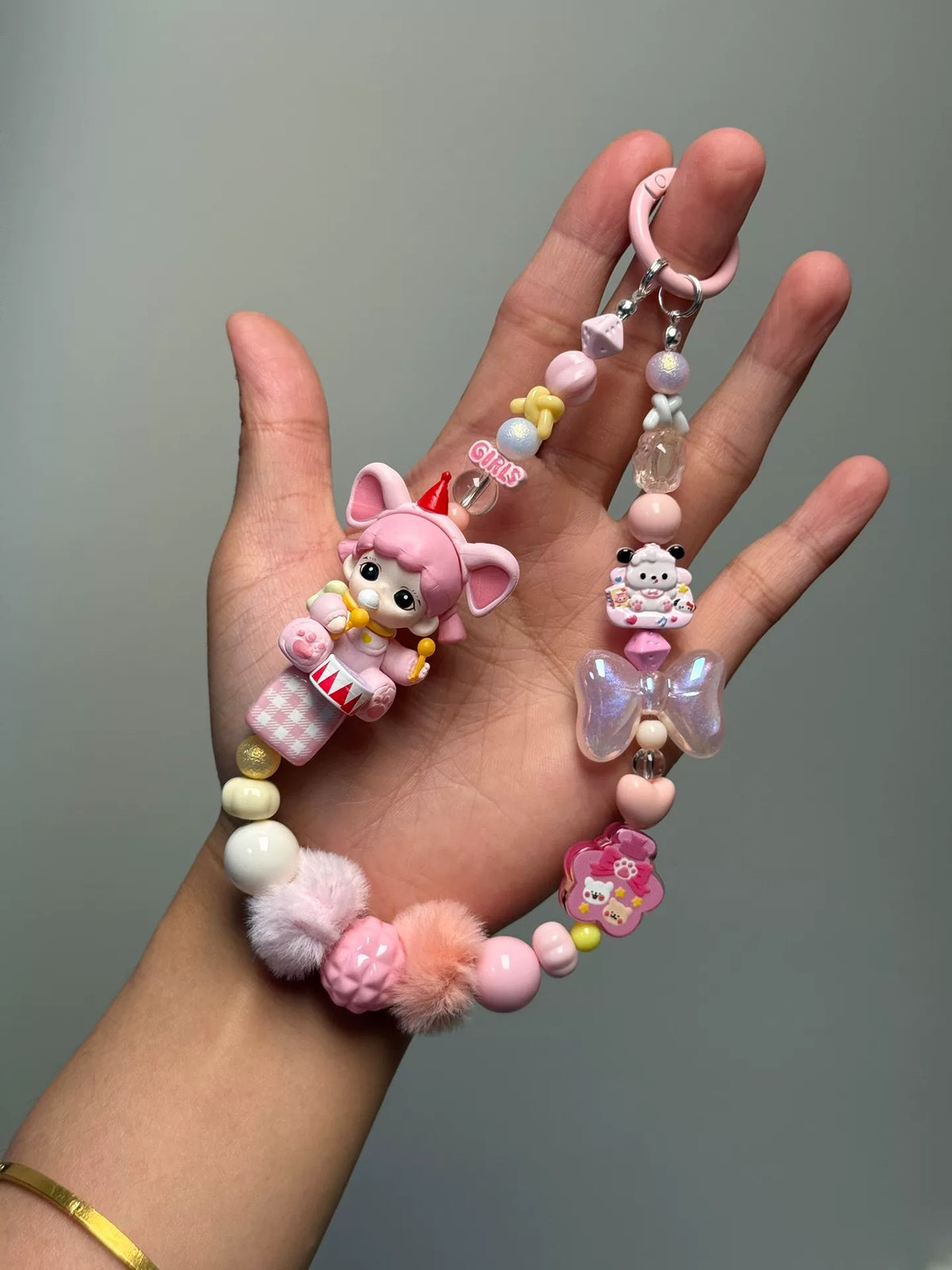 ピンクの人形スマホストラップ バッグチャーム キーホルダー