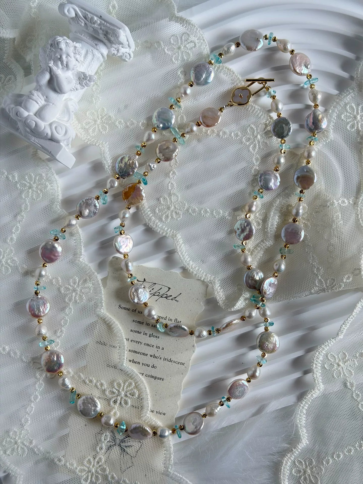 Collana lunga con più giri di perle d'acqua