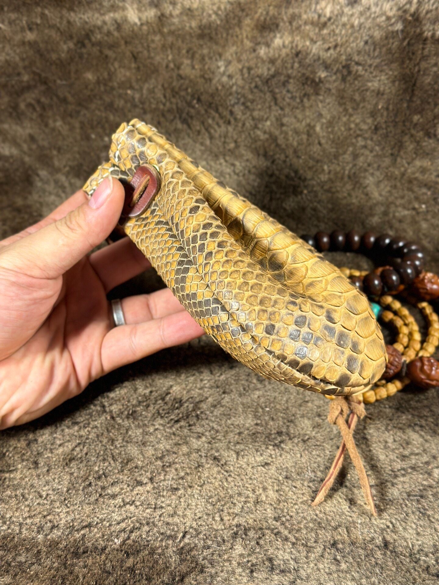 Artisanal Leather Pouch with Dragon Scale Texture and Adjustable Opening