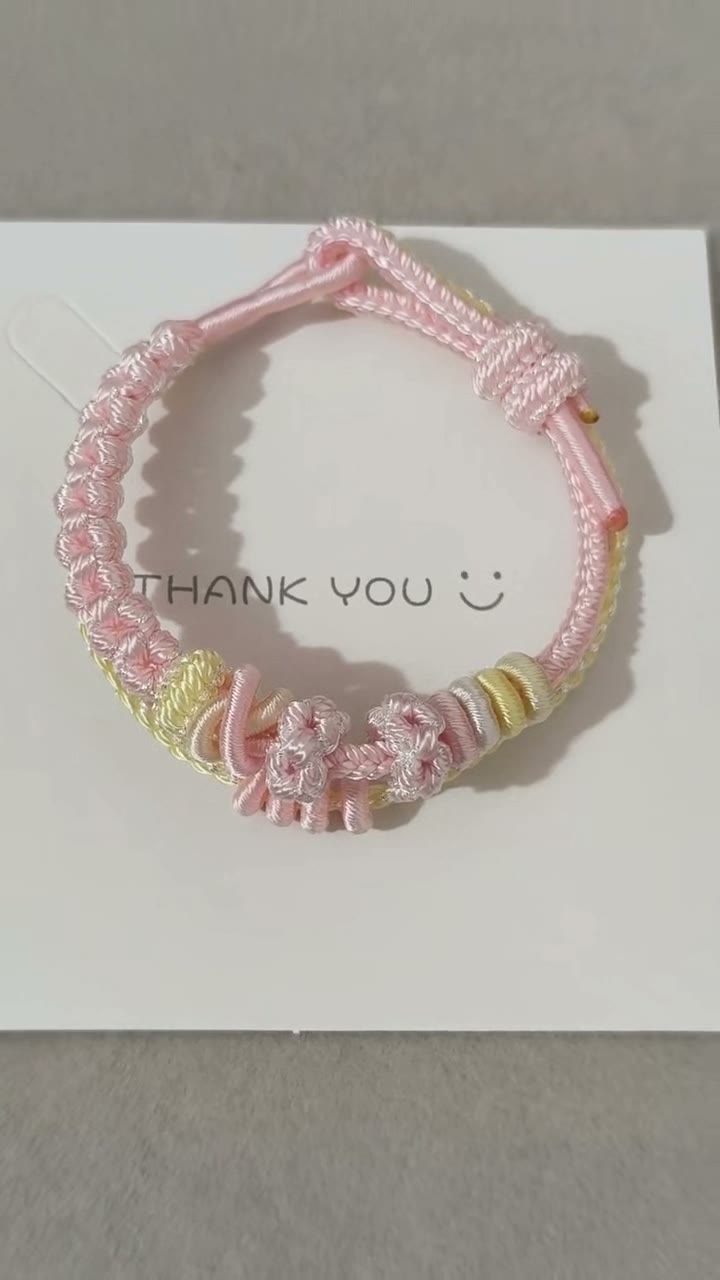 Pulseira Tecida em Rosa Gradiente com Flores