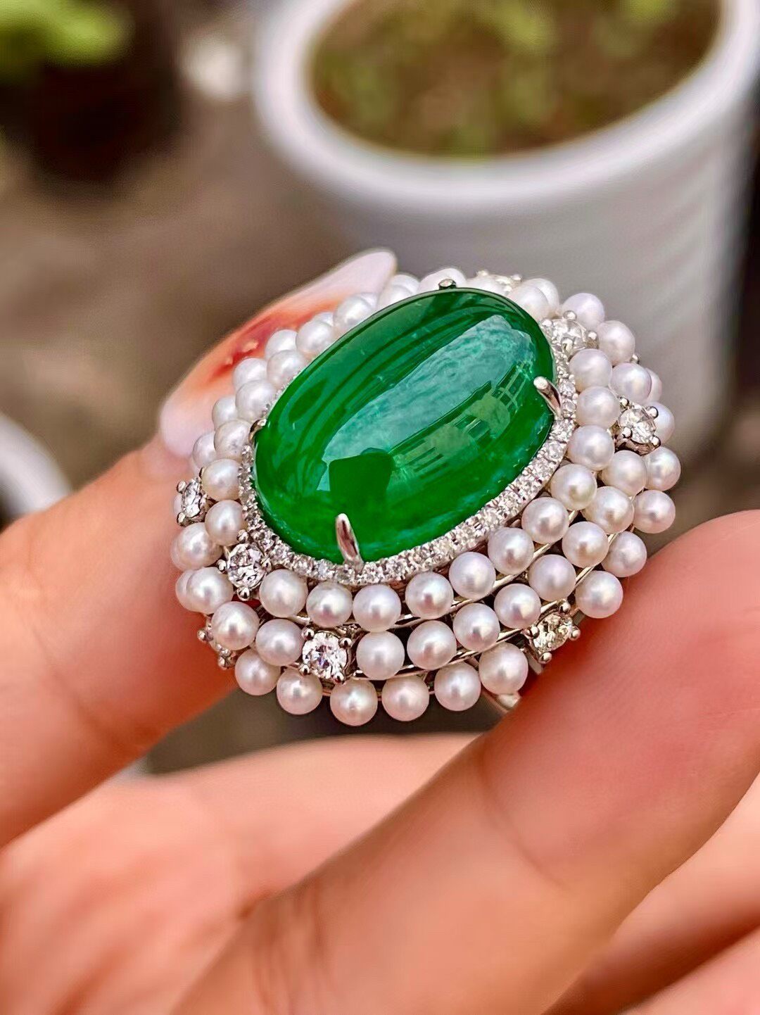 18k Gold Ring with 11.8ct Cabochon Emerald, 0.71ct Diamond Halo, and Pearl Border