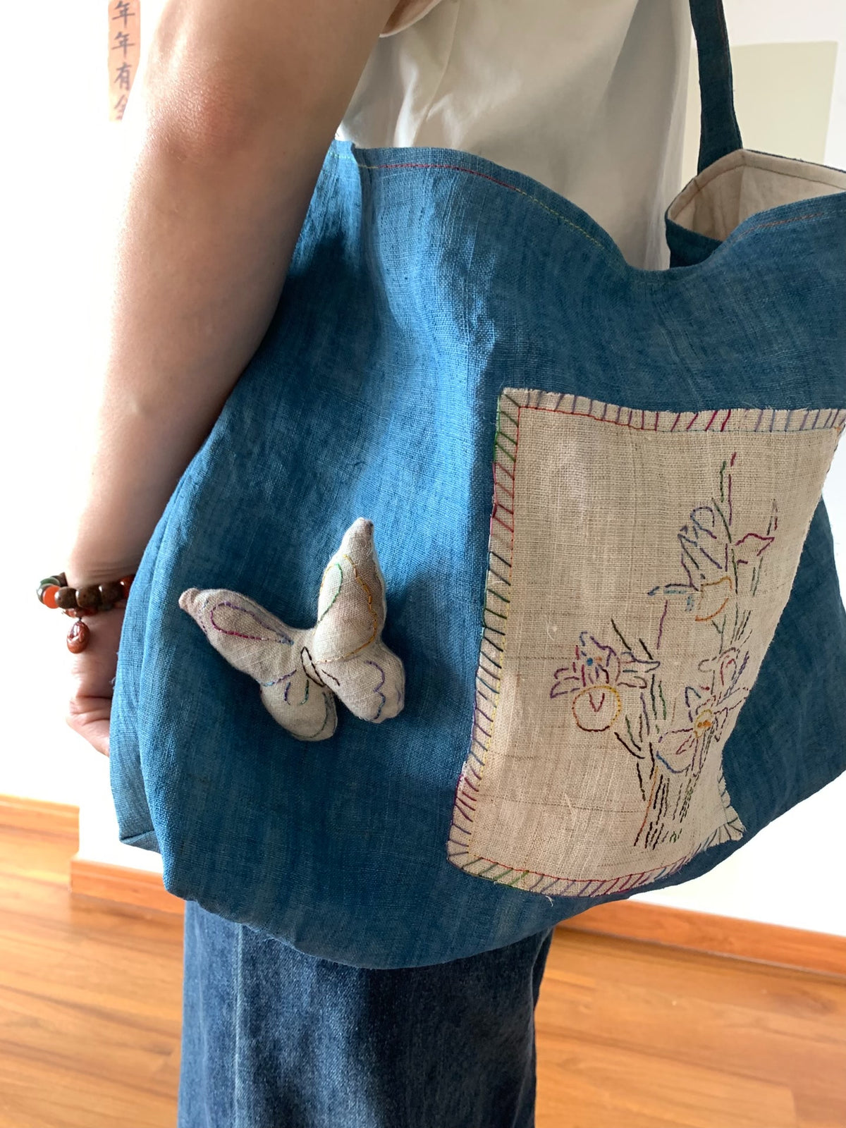 Handwoven Indigo Ramie Shoulder Bag with Iris Embroidery