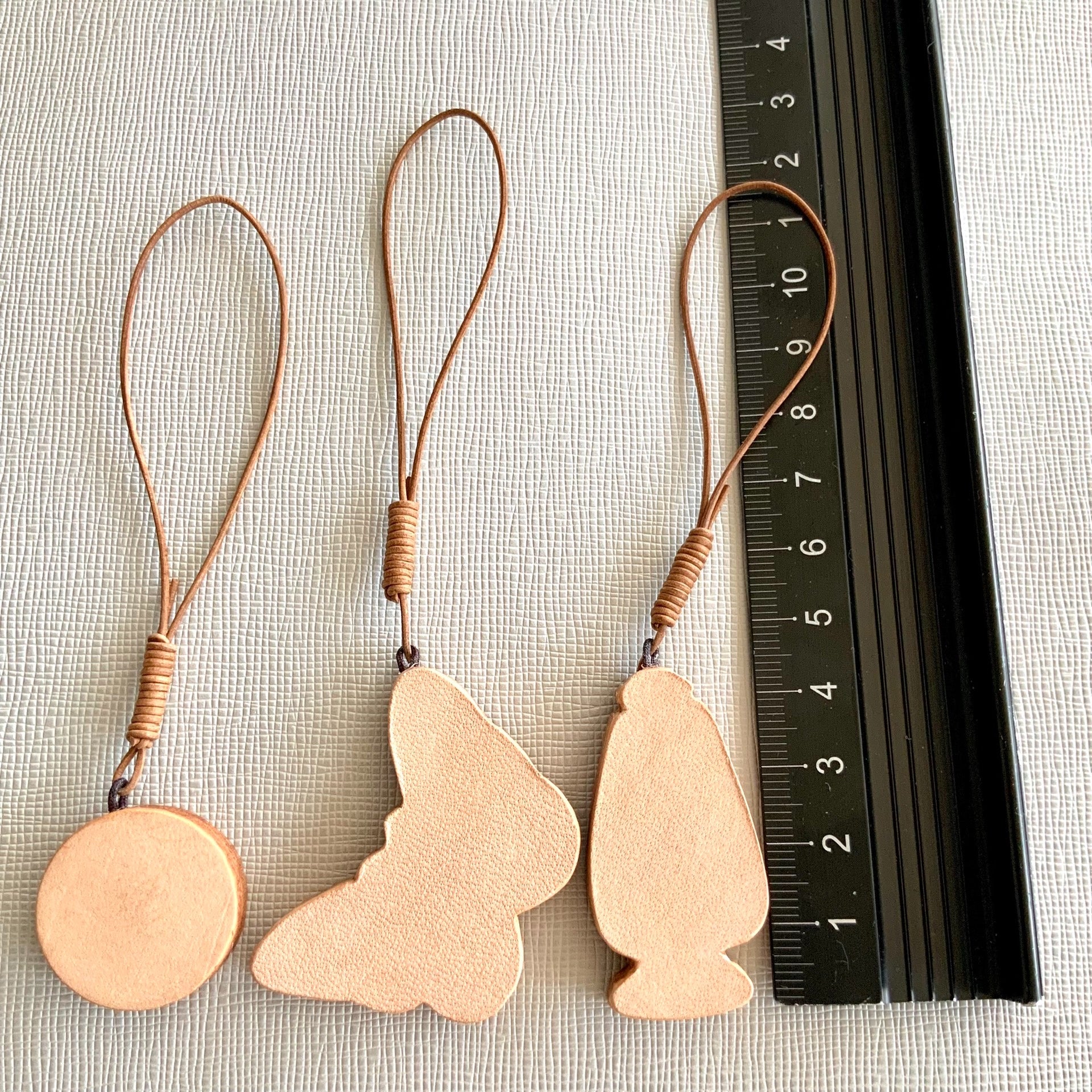 Italian Vegetable-Tanned Leather Butterfly, Lantern, and Moon Star Charms Set