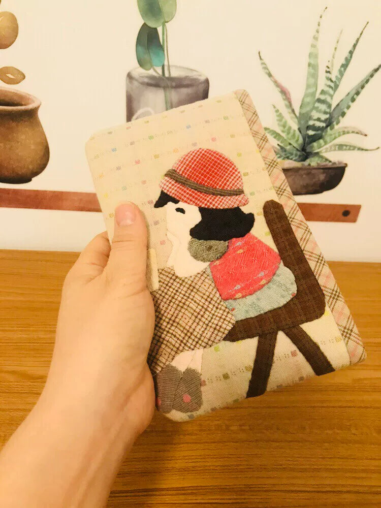 Estuche con cremallera de tejido teñido de hilo hecho a mano