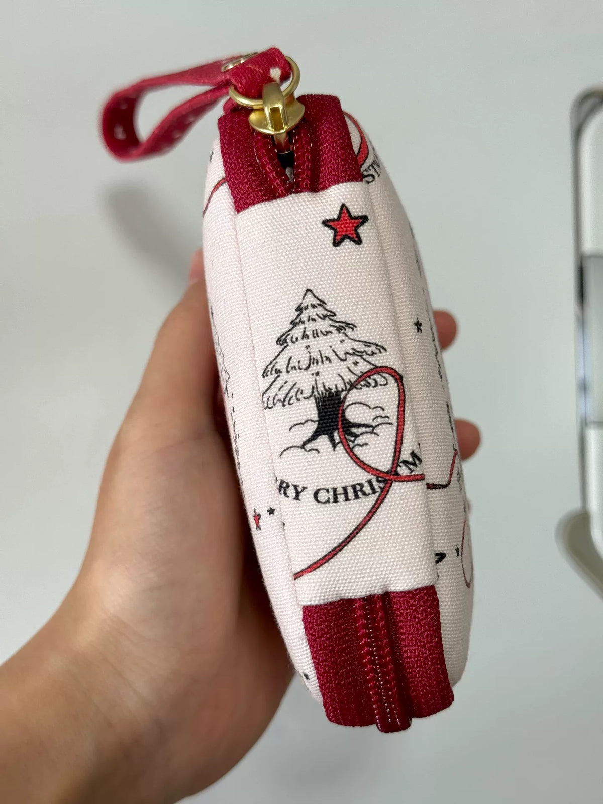 Handgjord smyckväska i tyg med julmotiv