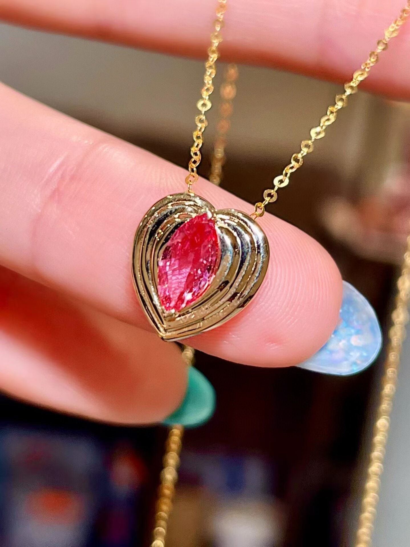 18k Gold Heart Pendant with Marquise-Cut Pinkish-Red Gemstone
