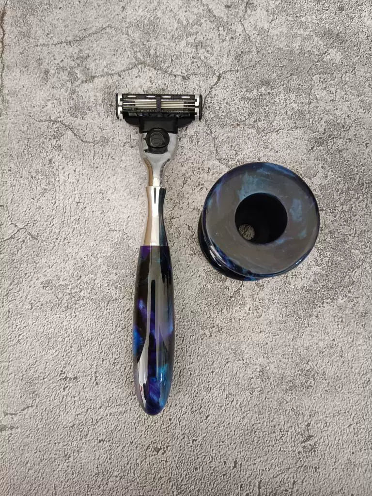 Manual Razor with Three Blade Cartridge