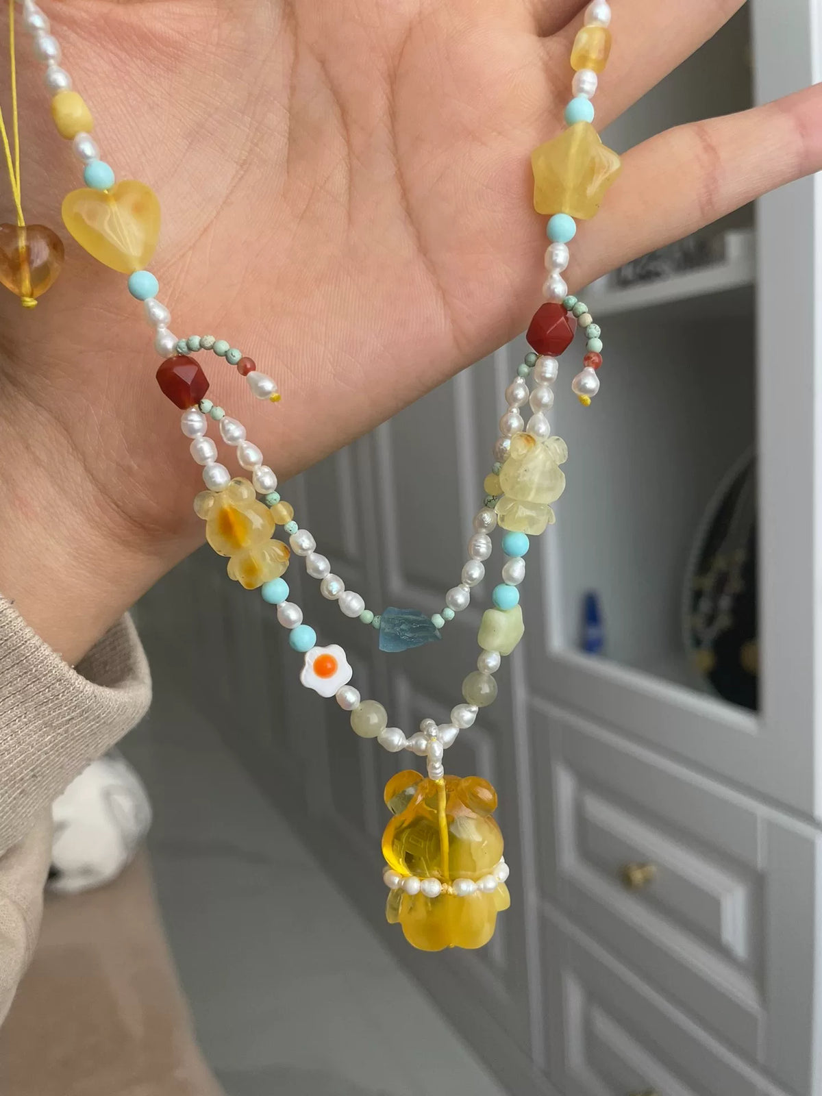 Collier double rang ours en ambre, perles et turquoise