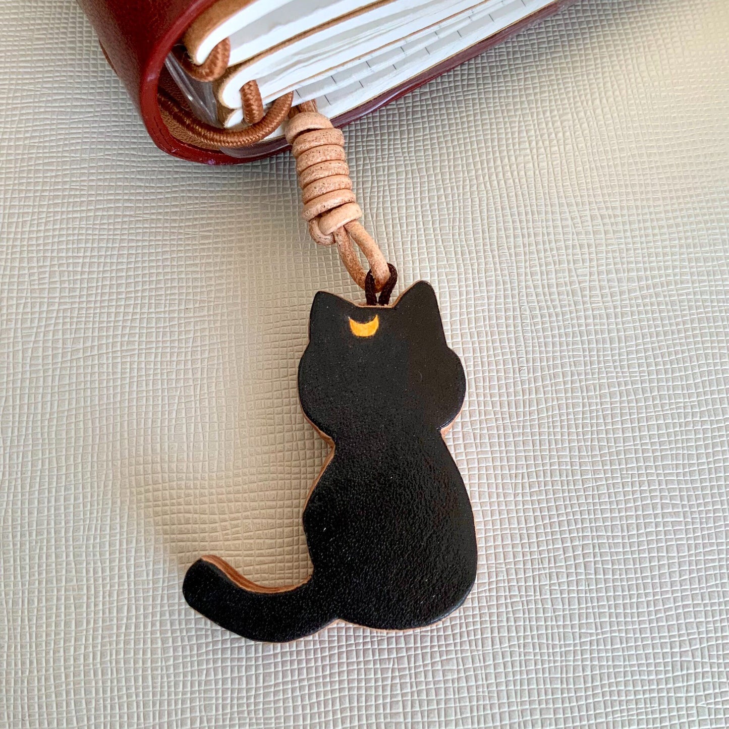 Two Thick Leather Keychain Pendants: Black Cat and Blonde Girl