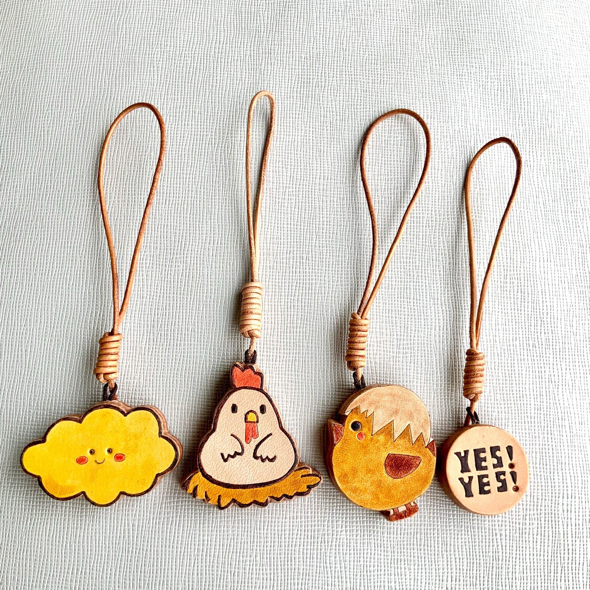 Handcrafted Leather Charm Set with Cartoon Motifs