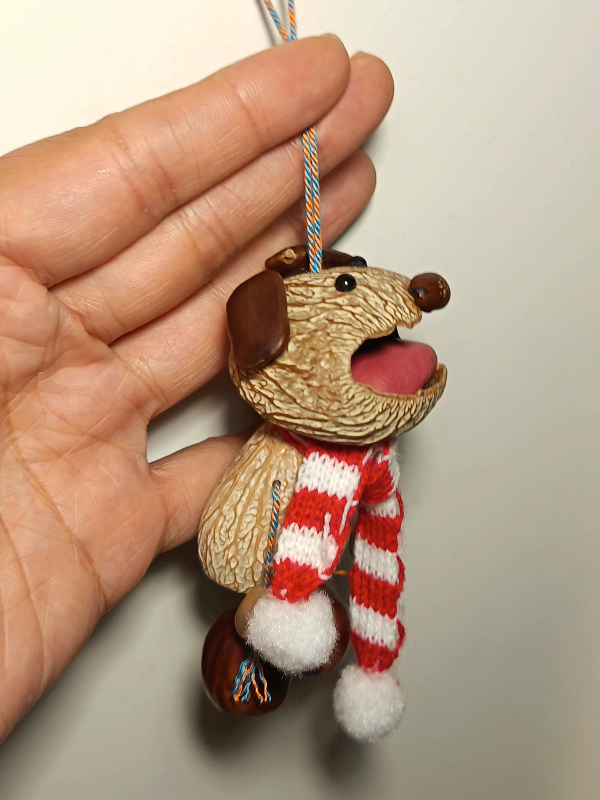 Walnut Shell Dog Rattle Pendant