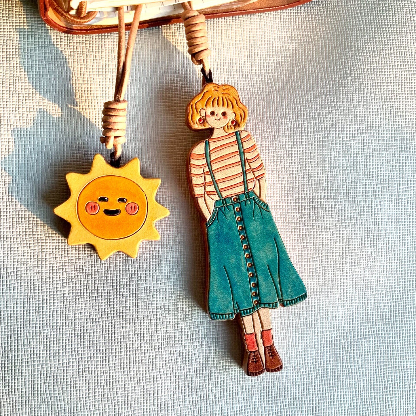 Hand-Painted Leather Girl and Sun Bag Charms