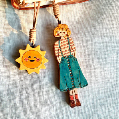 Hand-Painted Leather Girl and Sun Bag Charms
