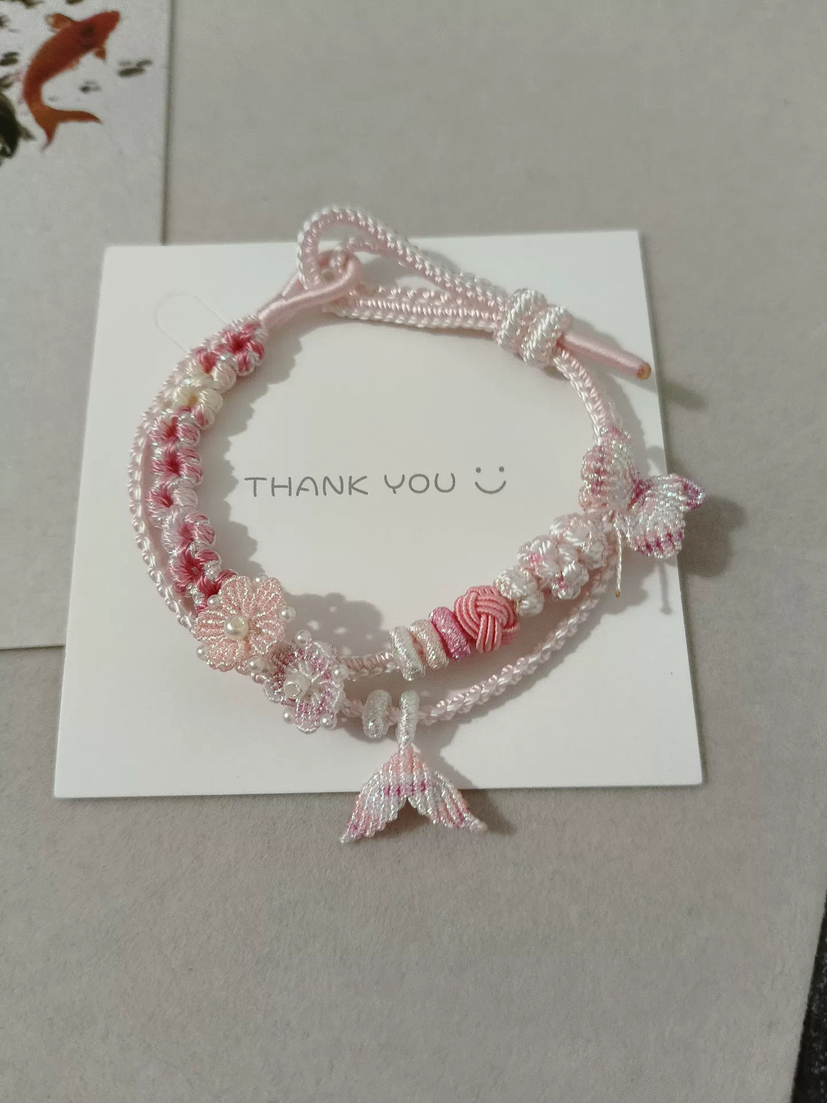 Pulseira Trancada em Gradiente Rosa e Branco Artesanal