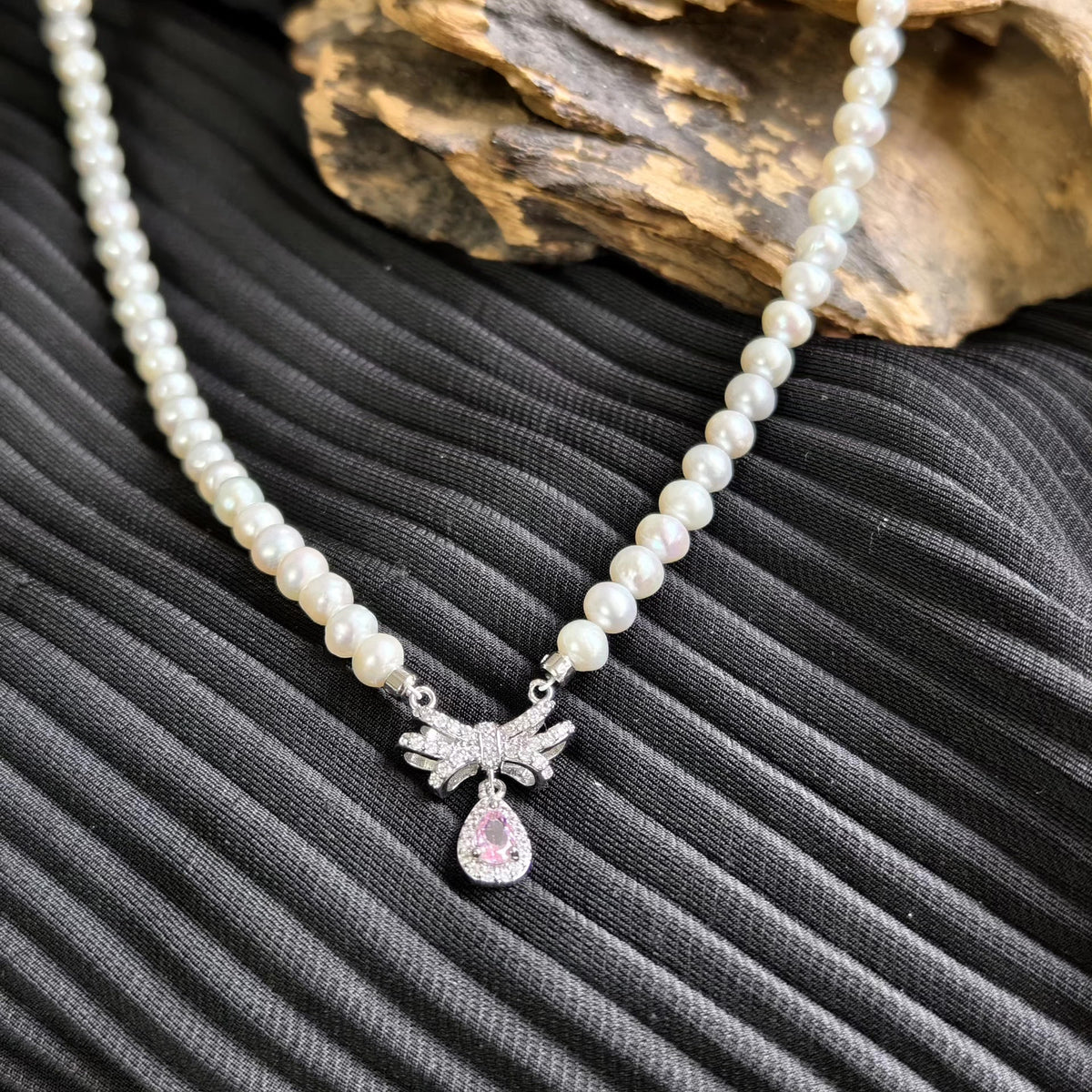 Pearl Necklace with Pink Bow Pendant