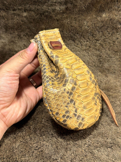 Artisanal Leather Pouch with Dragon Scale Texture and Adjustable Opening