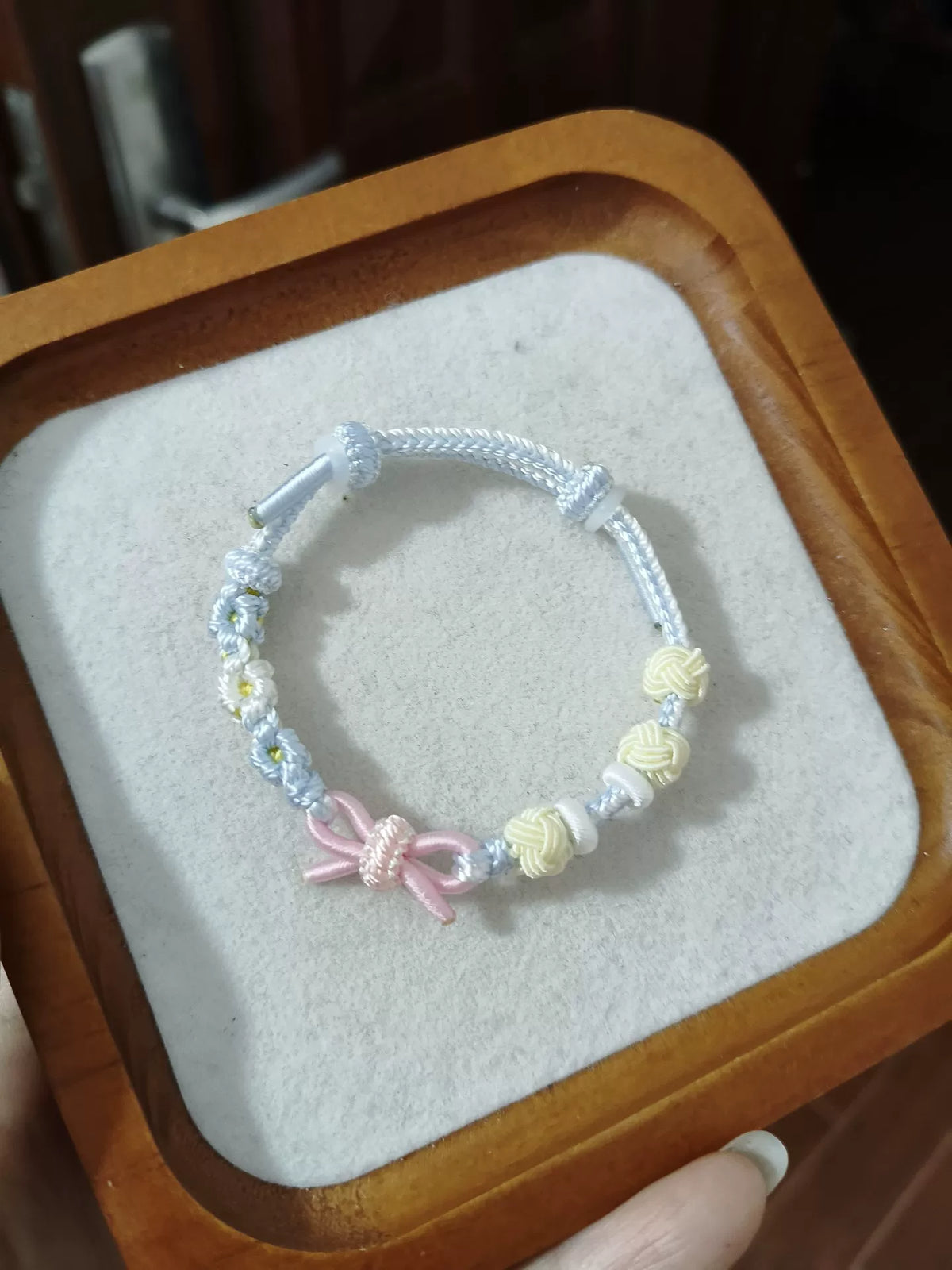 ハンドメイド編みコードブレスレット ピンクのリボン