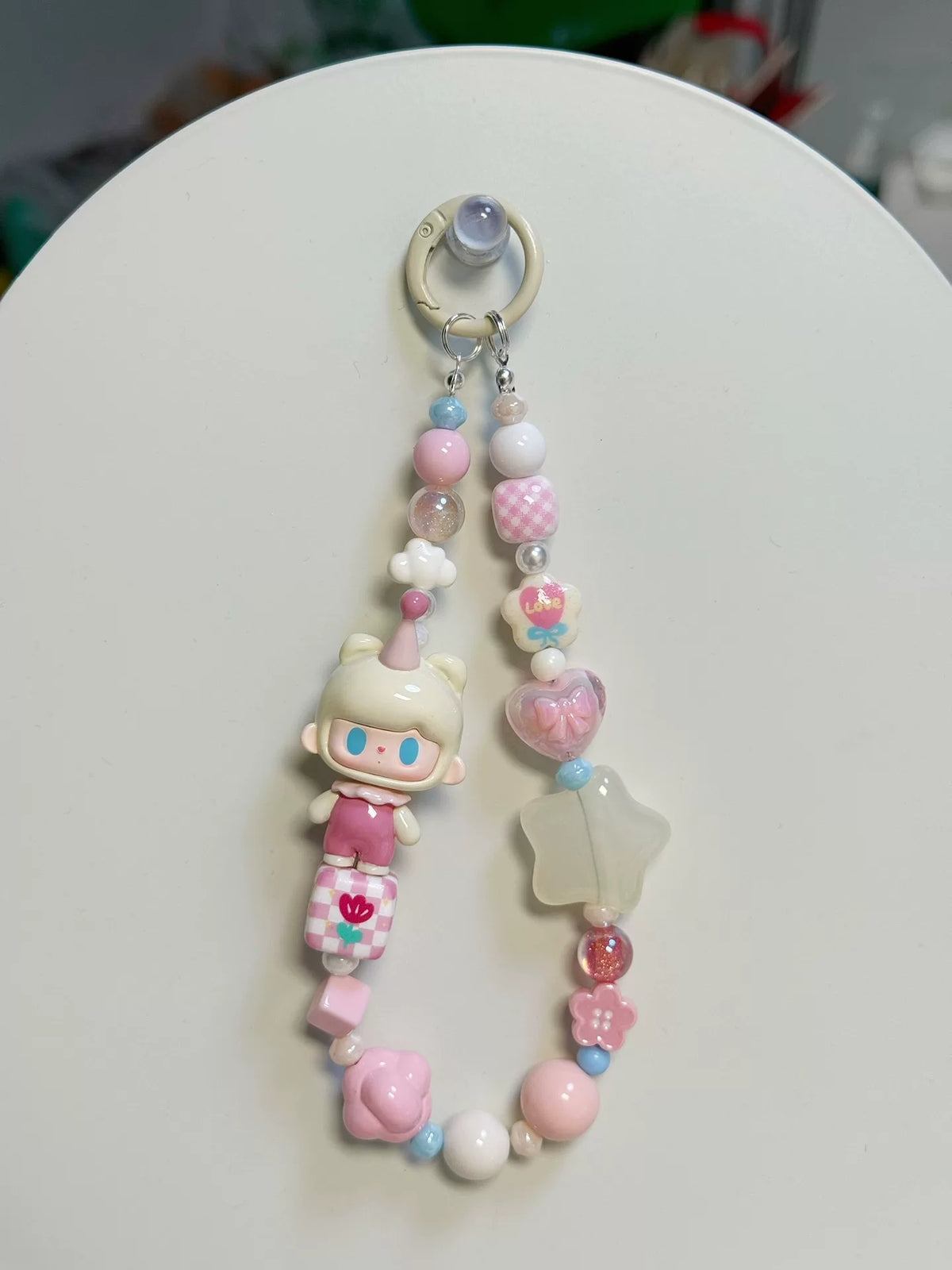 Dragonne de téléphone et porte-clés aux perles et personnage à capuche d'ours