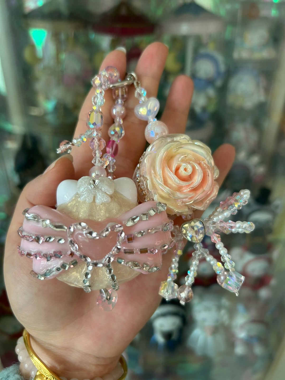 Roze Kraalpop Telefoonhanger met Strass Roos