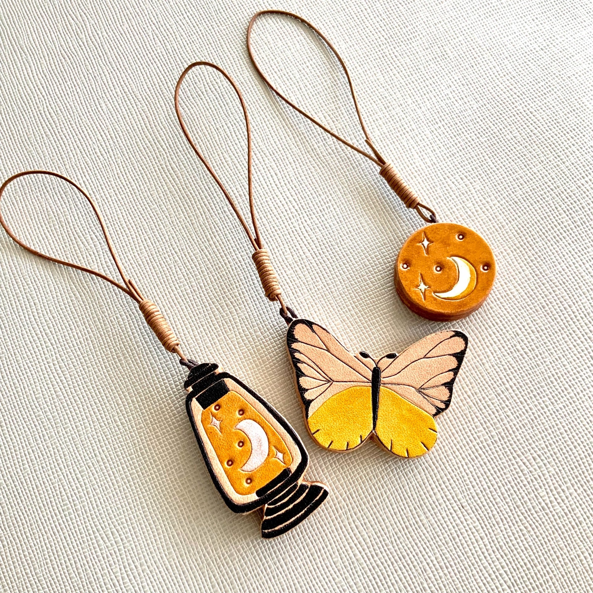 Italian Vegetable-Tanned Leather Butterfly, Lantern, and Moon Star Charms Set