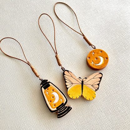 Italian Vegetable-Tanned Leather Butterfly, Lantern, and Moon Star Charms Set