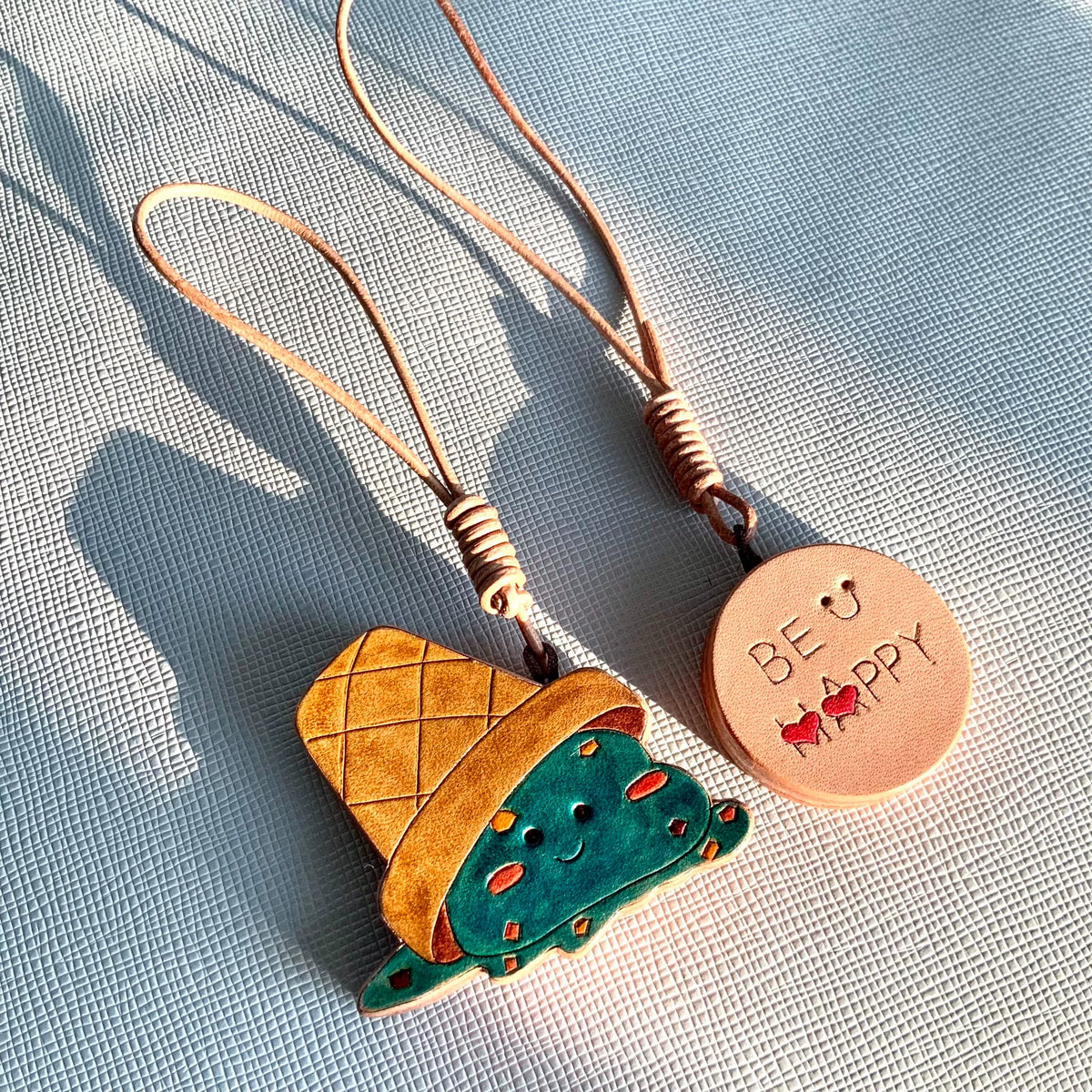 Llavero y colgante de bolso de cuero de helado derretido