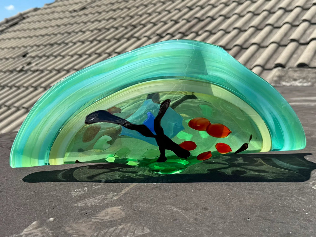Vintage skål i grönt konstglas med snäcksform