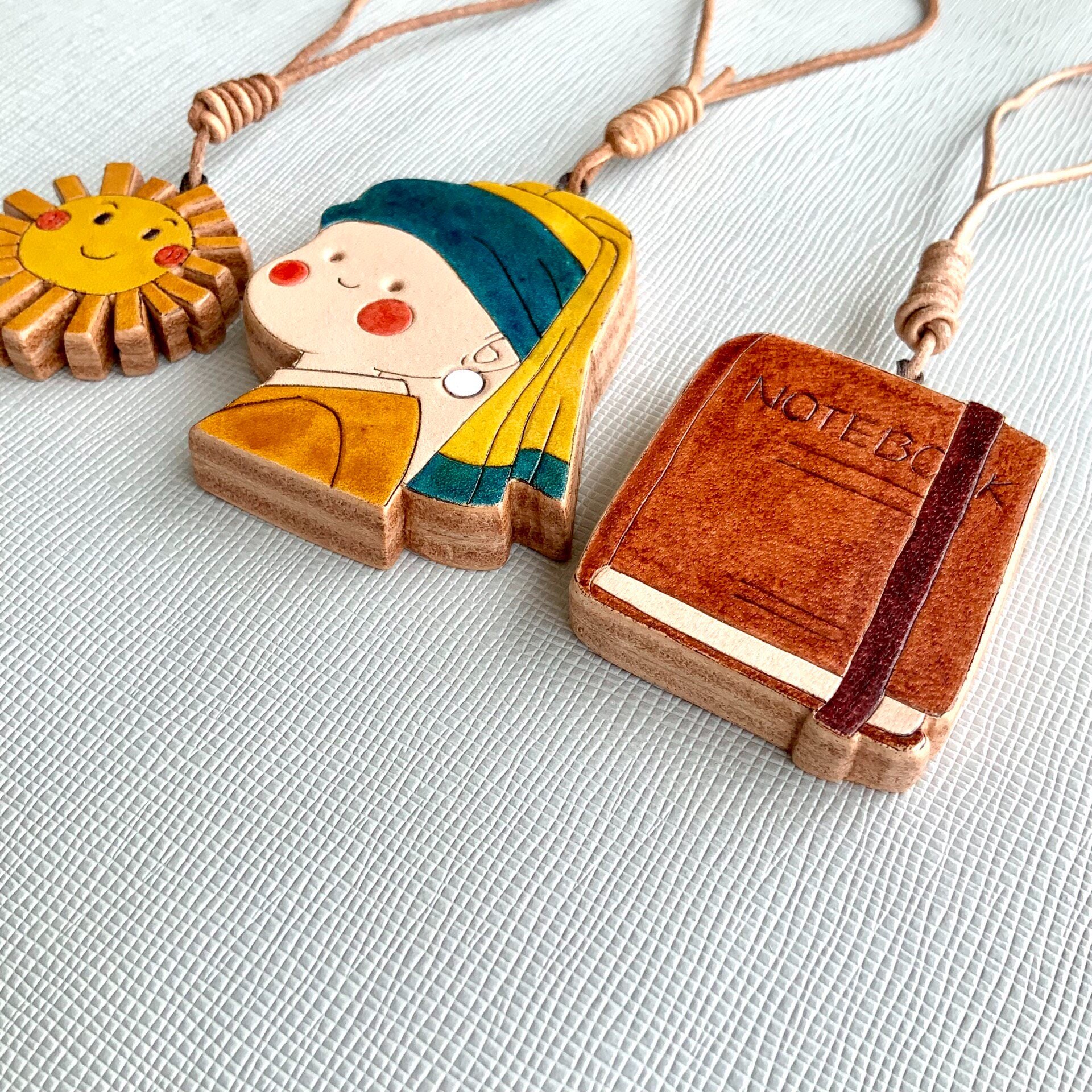 Girl with a Pearl Earring Leather Charm Set