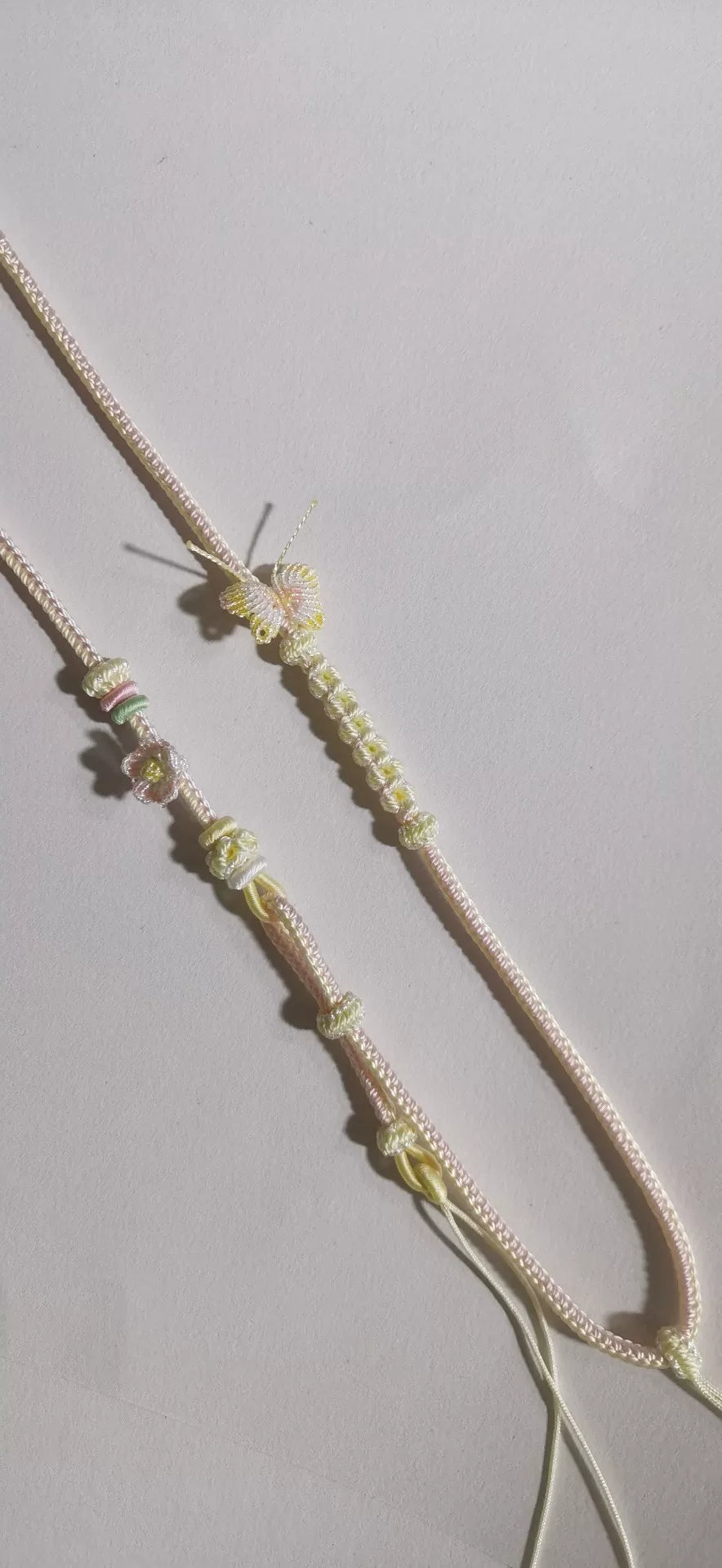 Cordon de collier tressé artisanal dégradé rose et vert