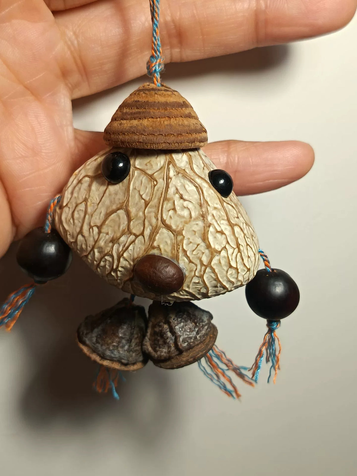 Walnut Shell Hand Rattle Ornament