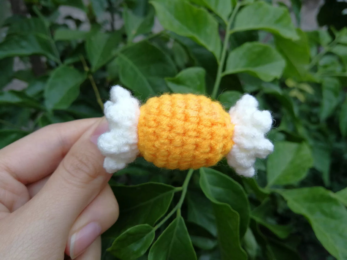 Clip de pelo de caramelo tejido a mano naranja y amarillo