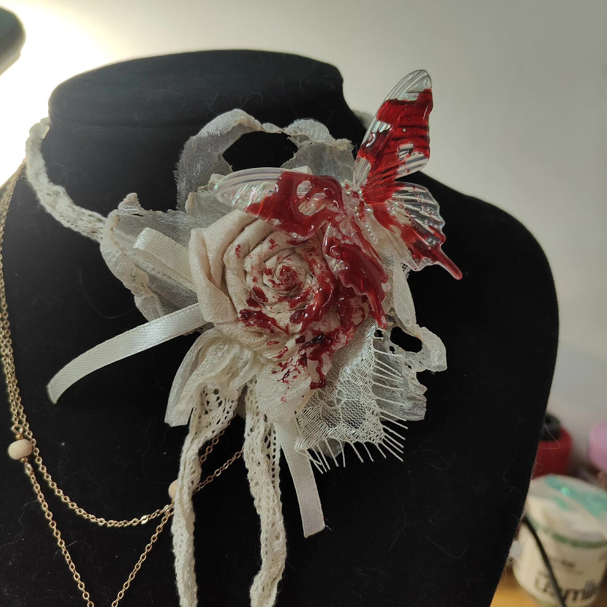 Withered Rose Brooch with Red Butterfly