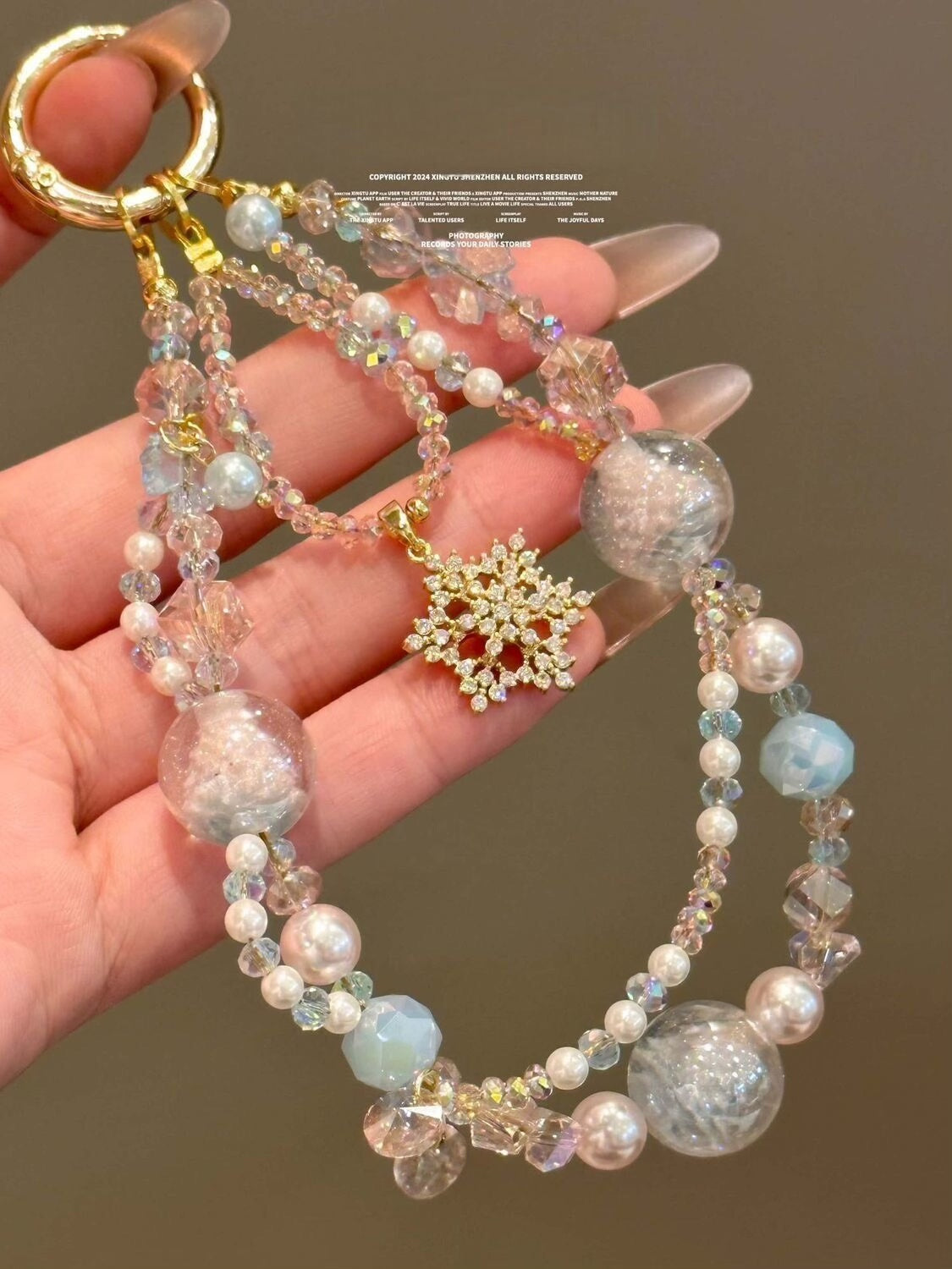 Beaded Phone Charm with Snowflake Motif