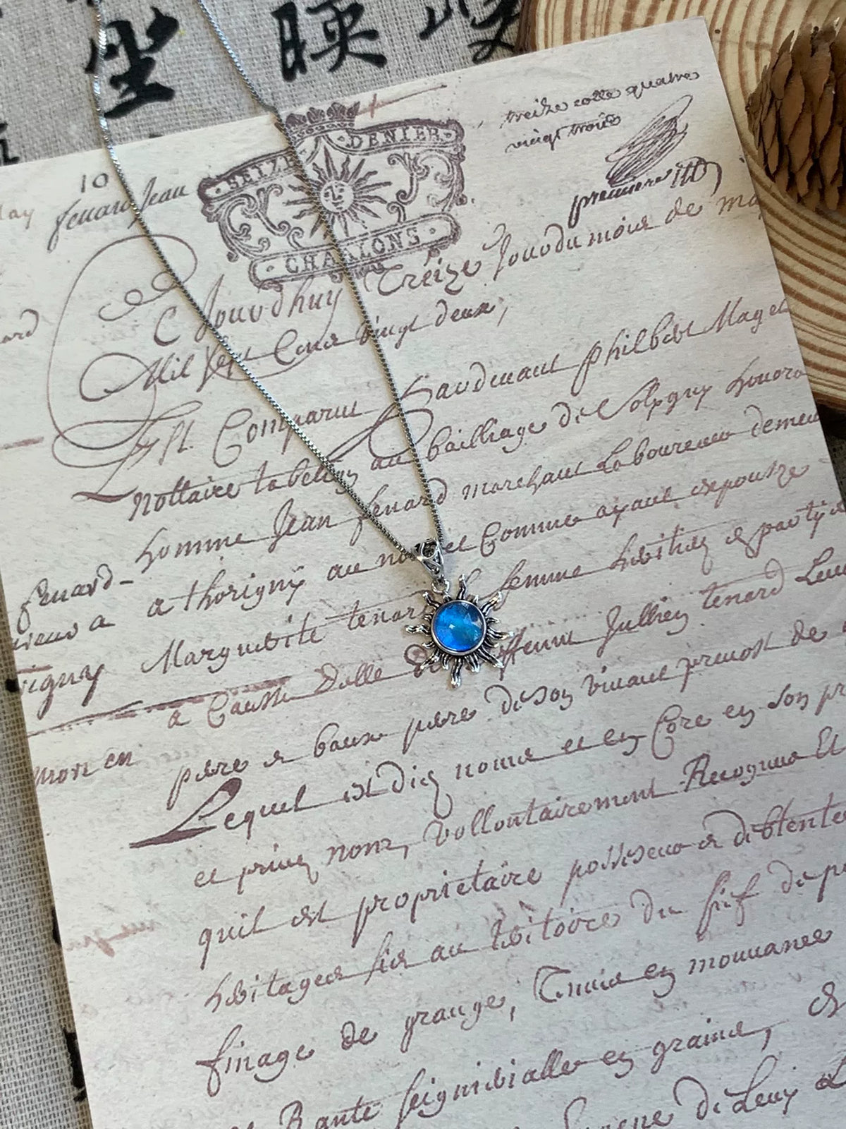 Collana Sole in Rame con Ala di Farfalla Blu