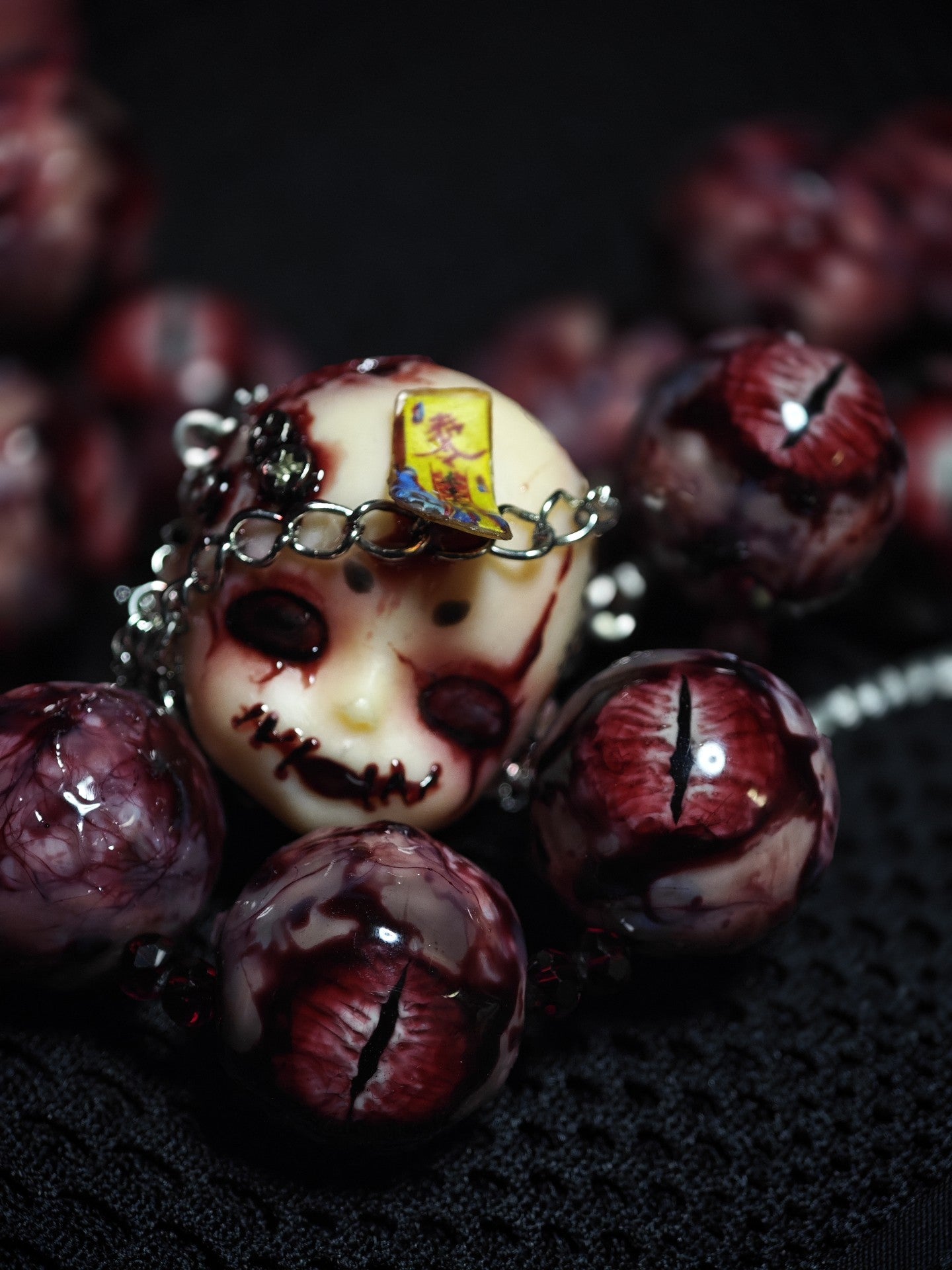 Handcrafted Doll Head Pendant with Eye Beads and Chain