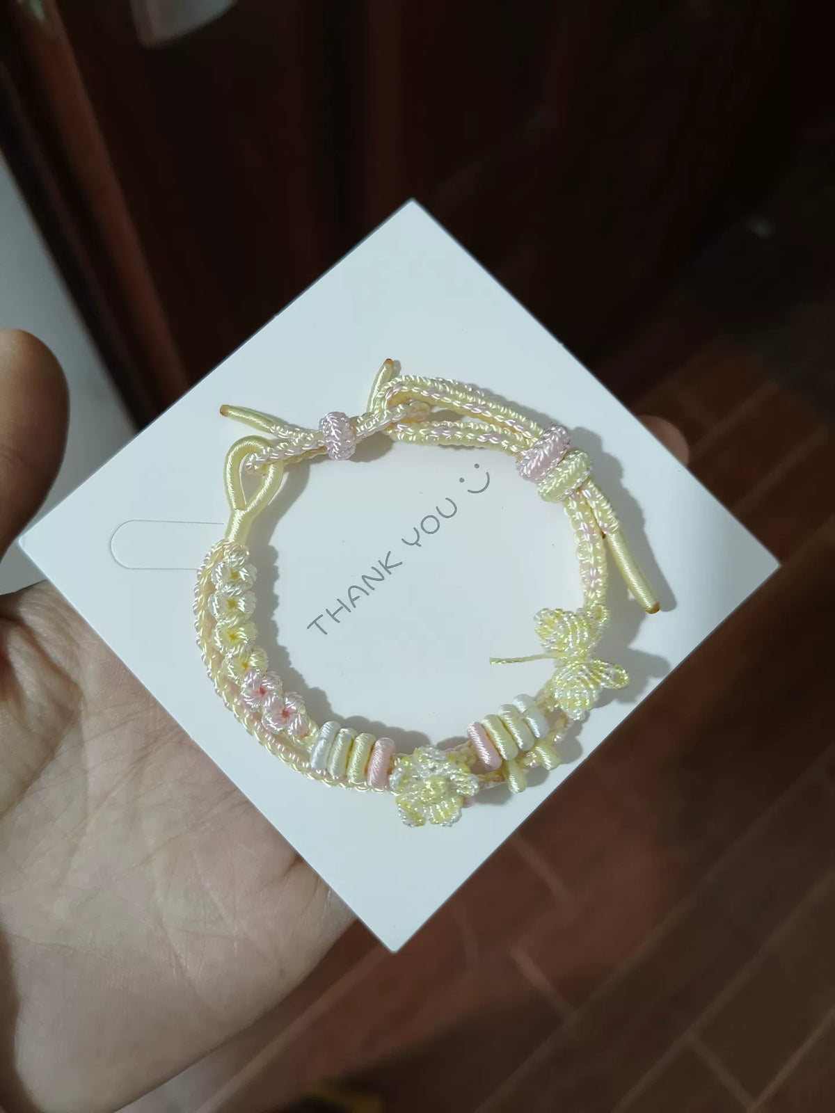 Bracelet en cordon tressé fait main dégradé crème et rose